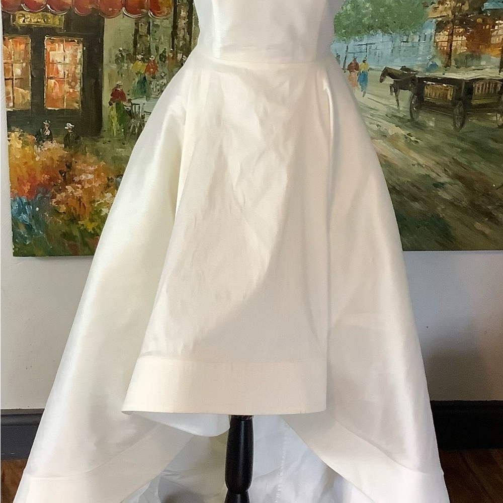 Anne Barge wedding gown.  High/low look with pockets